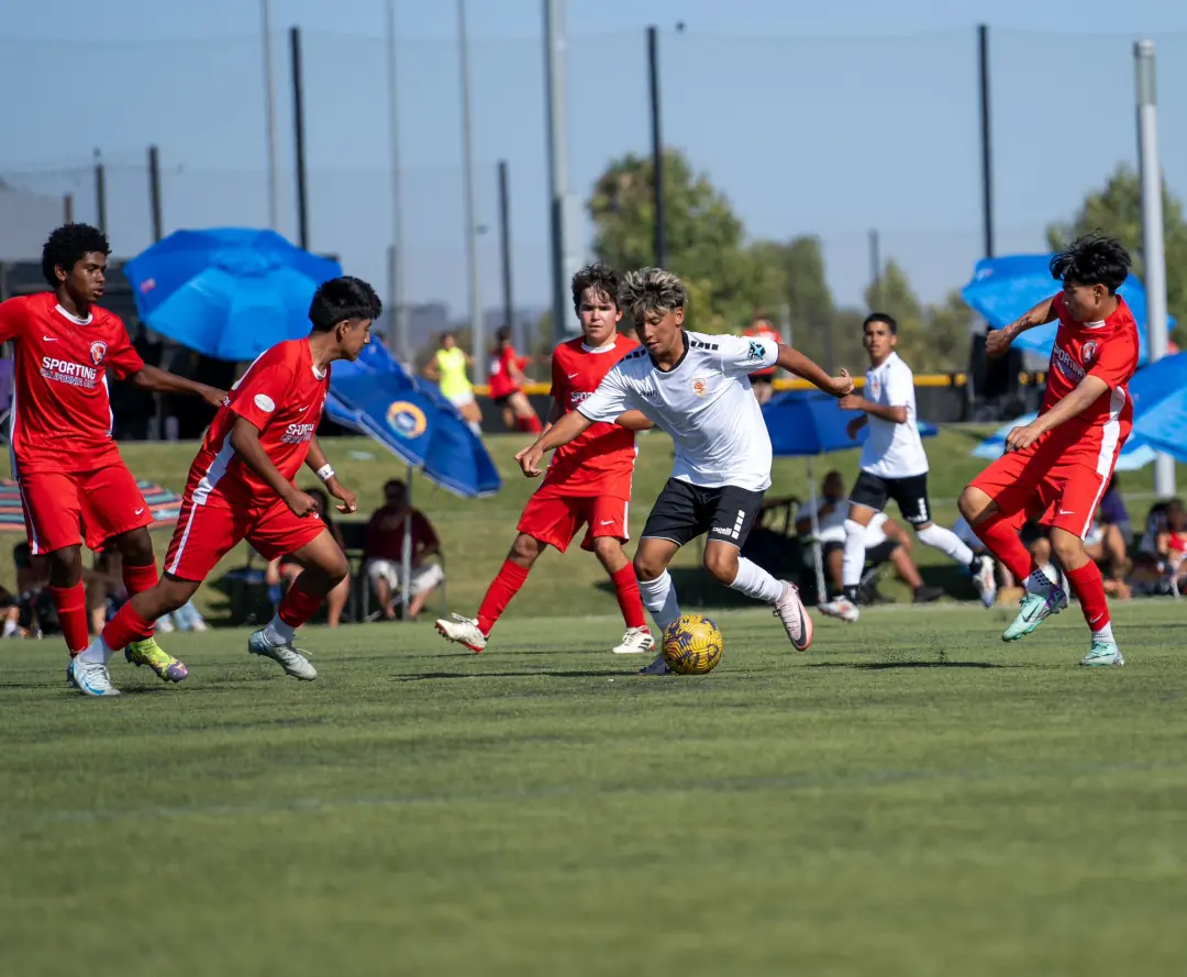 Two youth soccer teams in full-field action